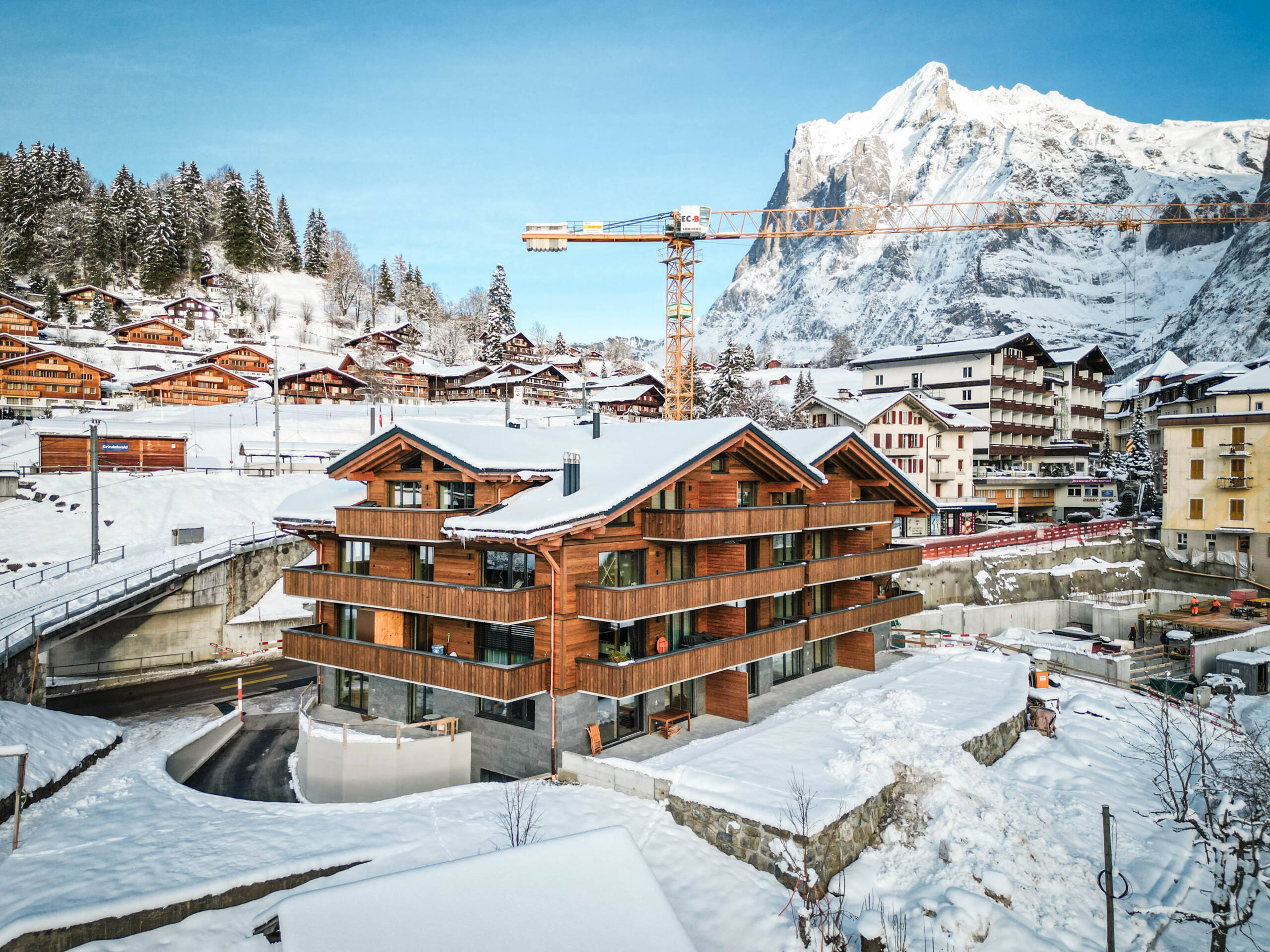 Chalet WALT exterior view at sunset - alpine architecture in the village center of Grindelwald