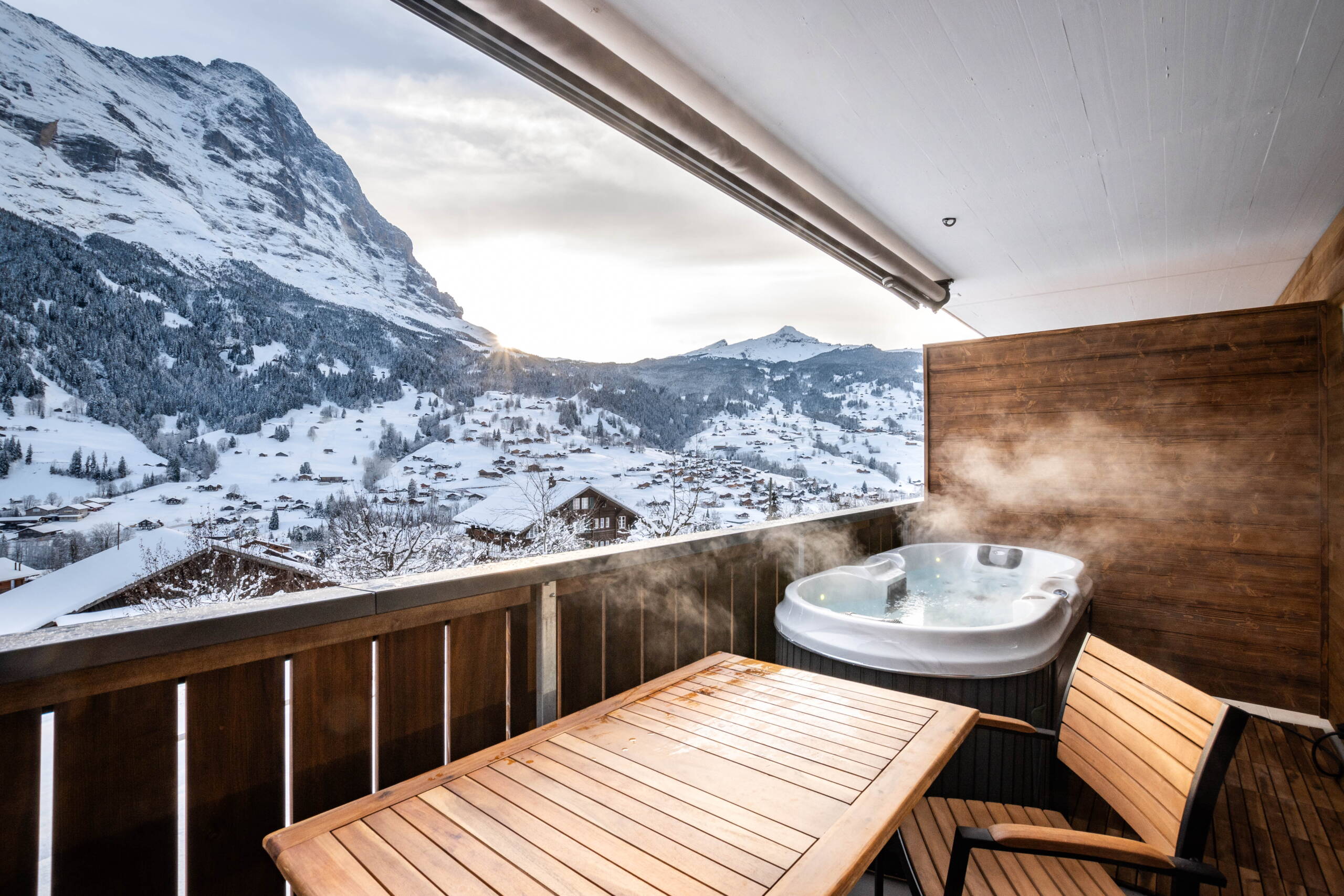 Balcony view in Chalet WALT - Relax in the whirlpool with a view of the Eiger north face.